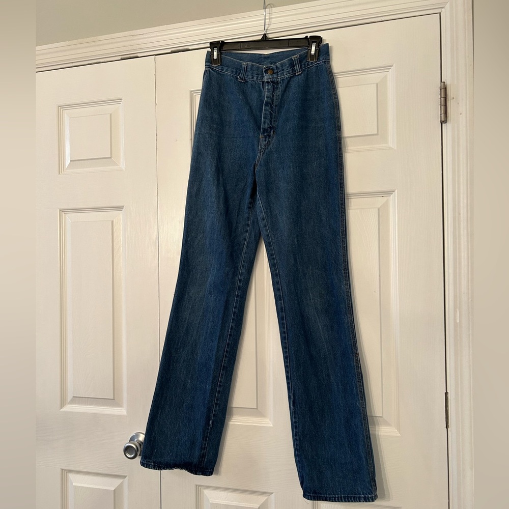 Vintage high rise medium wash straight leg jean